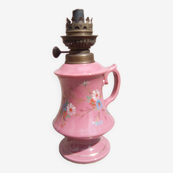 Oil lamp with floral decoration