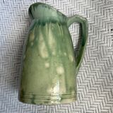 Turquoise green enamelled ceramic pitcher
