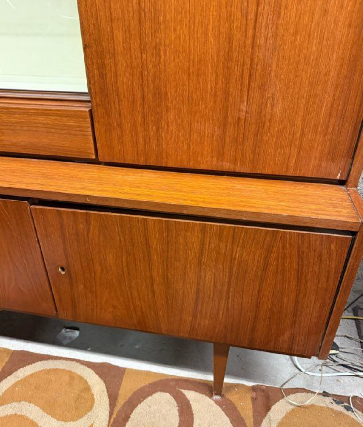 Vintage Scandinavian teak sideboard with compass feet from the 70s