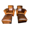 Deux fauteuils club avec repose pieds cuir