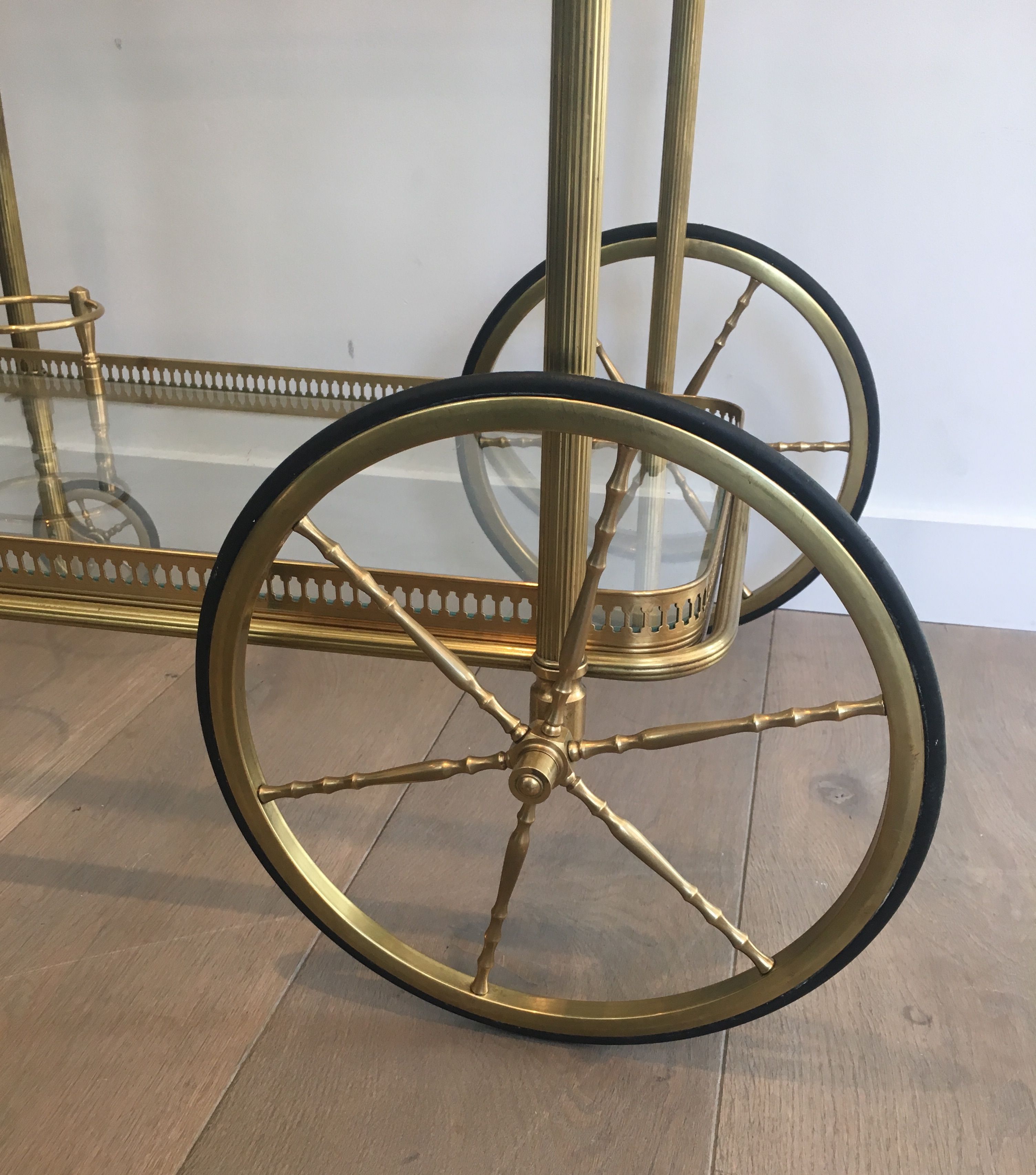 Neoclassical brass rolling table from Maison Baguès