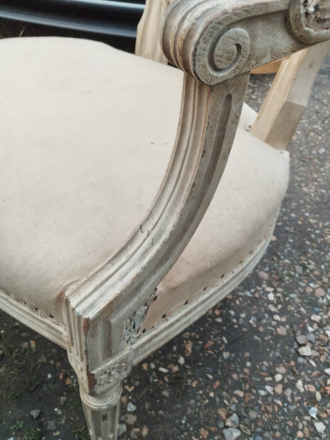 Antique armchair in Louis XVI style from the late 19th century.