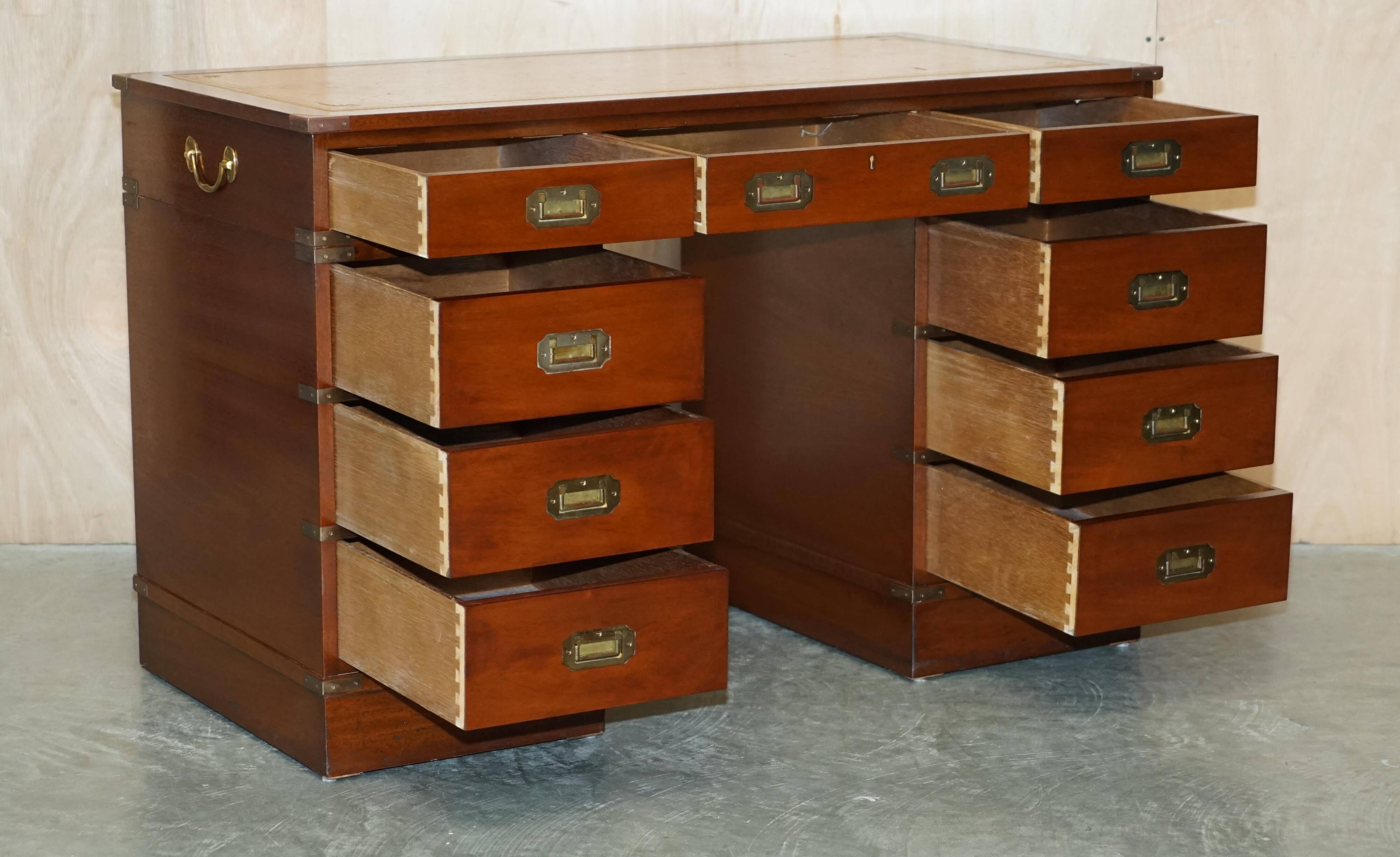 Vintage Harrods Kennedy desk in military campaign style with drawers.
