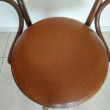 Thonet armchair, swivel, in wood and faux leather.