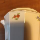 Coffee maker with floral decoration