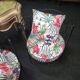 Paire de fauteuils Vintage en fer forgé avec coussins a motifs tropicaux
