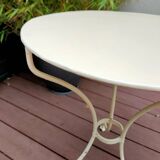 Old white iron garden table