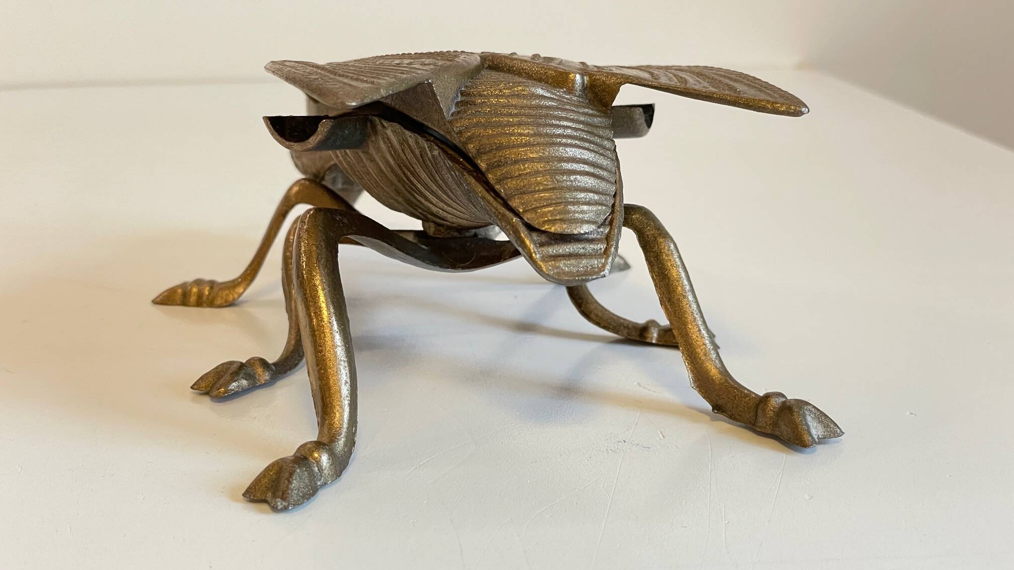 Vintage fly ashtray in patinated metal