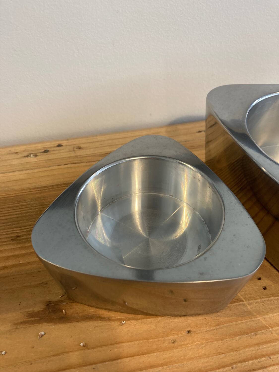 Pair of aluminum candlesticks