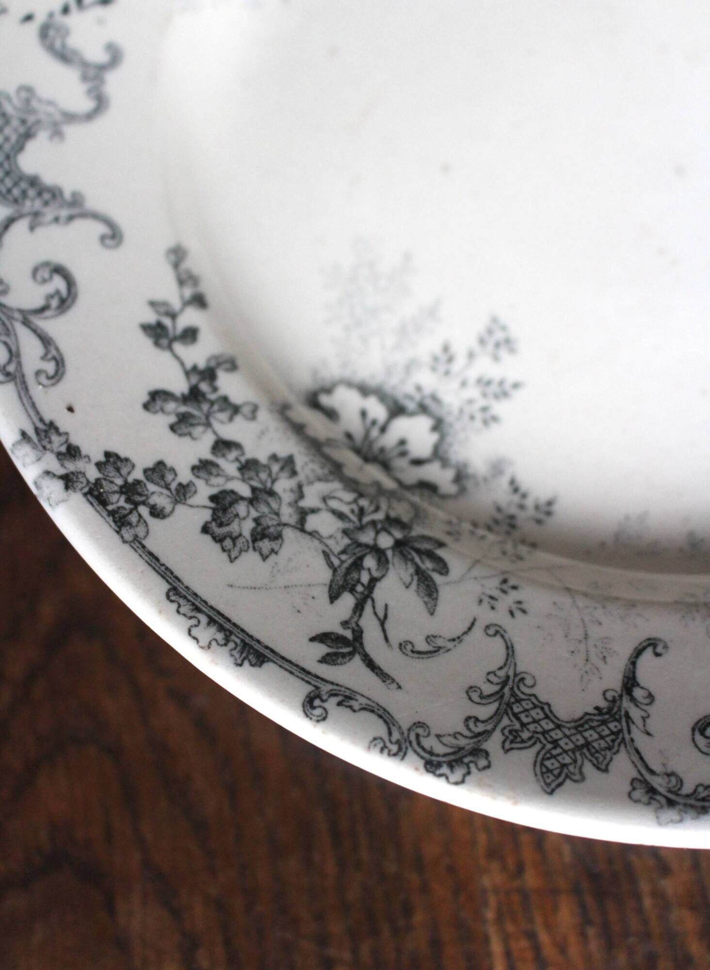 Black grey iron footed coupe Bourgeois