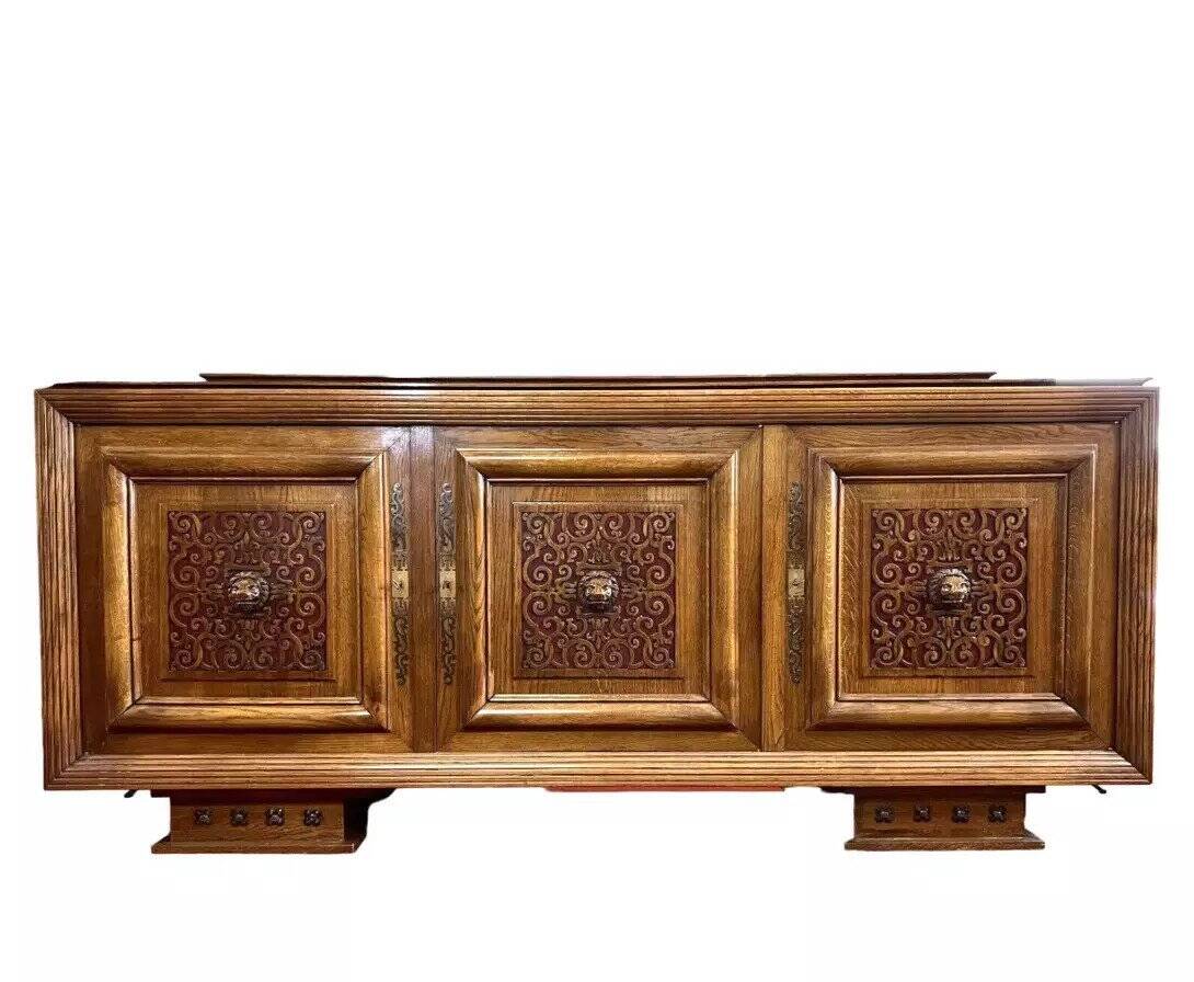 According to Charles Dudouyt: sideboard in a row from the Art Deco period in solid wood.