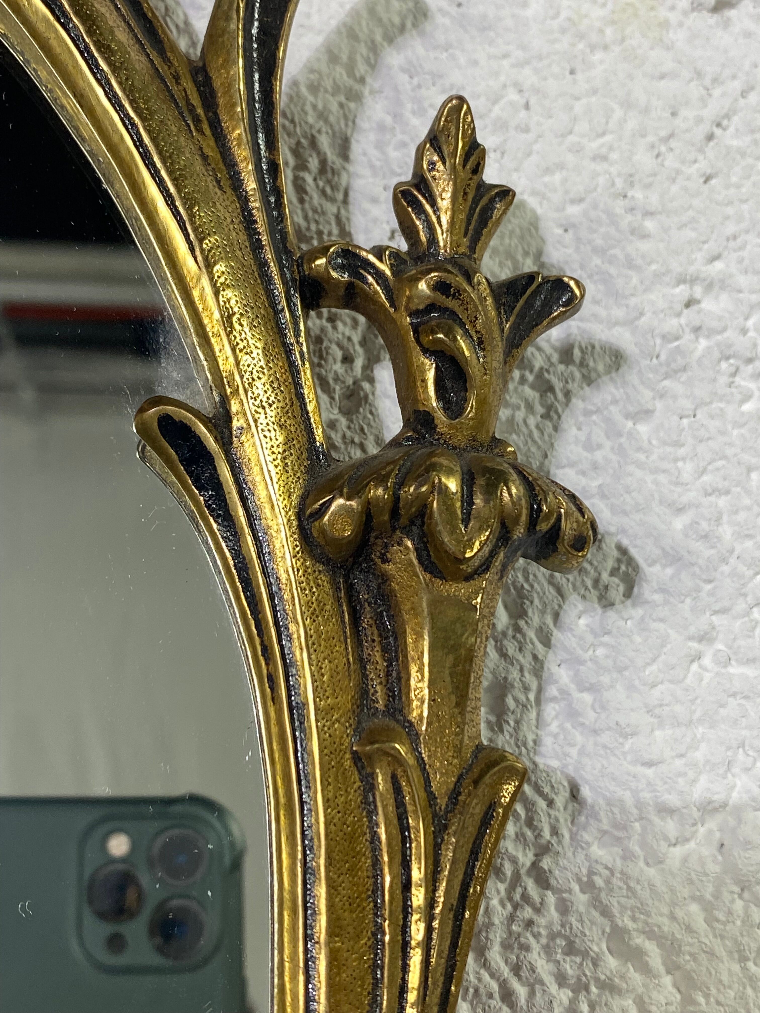 Oval gilded mirror