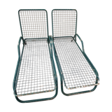 Pair of metal deckchairs