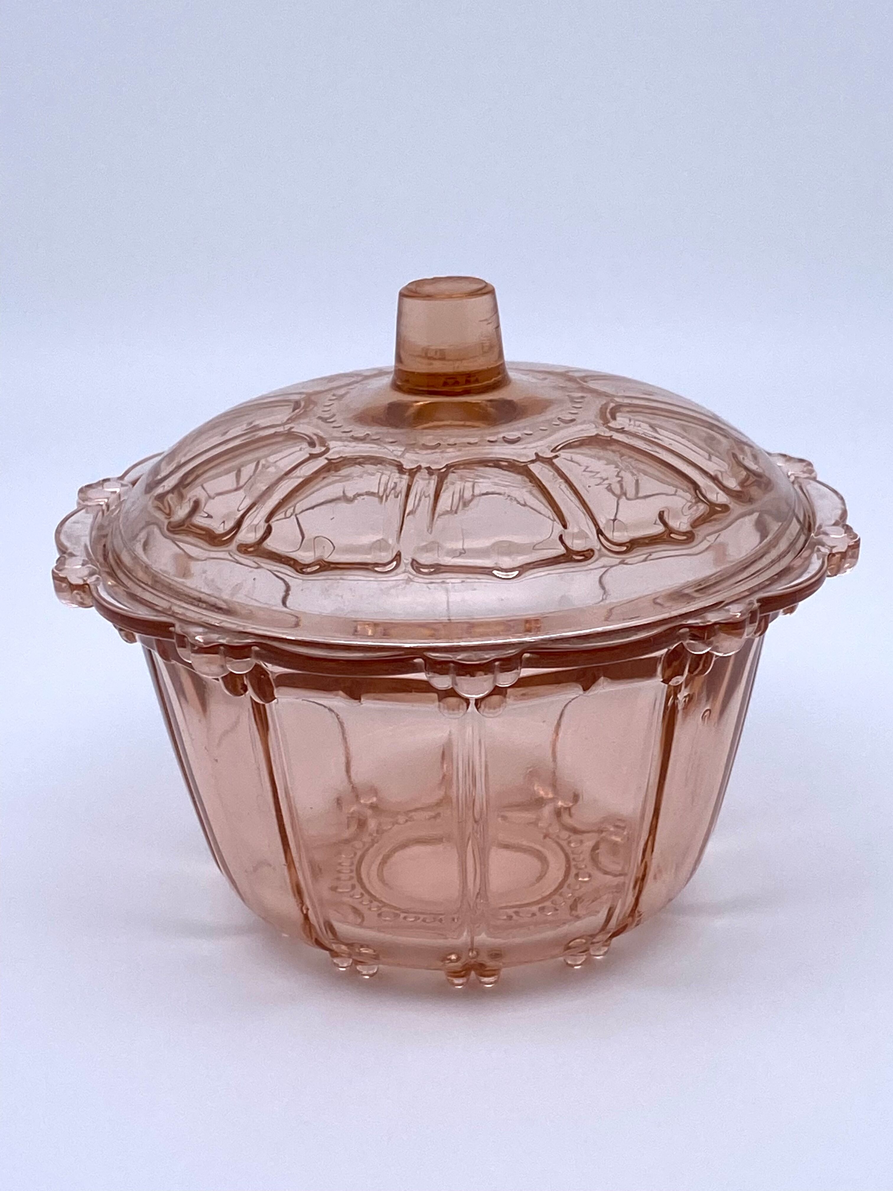 Sugar pot in worked pink glass