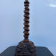 Sculpted wooden lamp with faces, antique.
