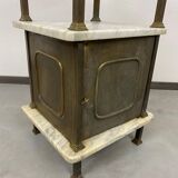 Brass bedside table with a marble top.