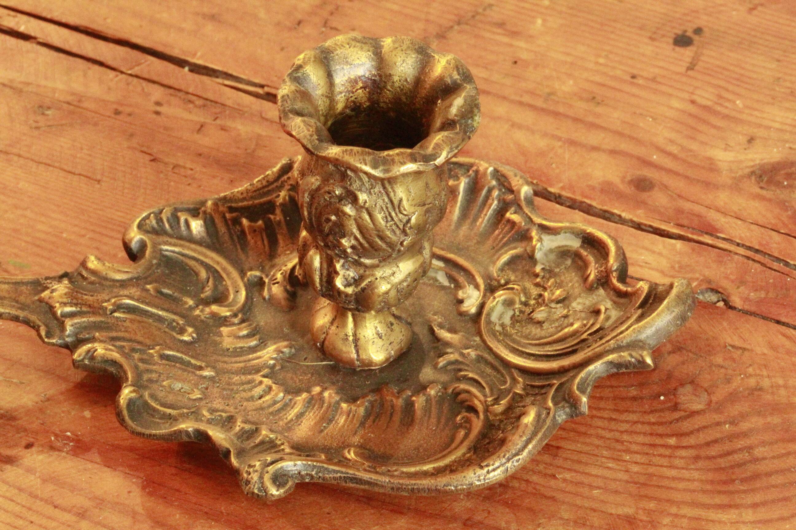 Old hand candle holder