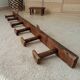 Old wall-mounted coat rack from a stable, folk art.