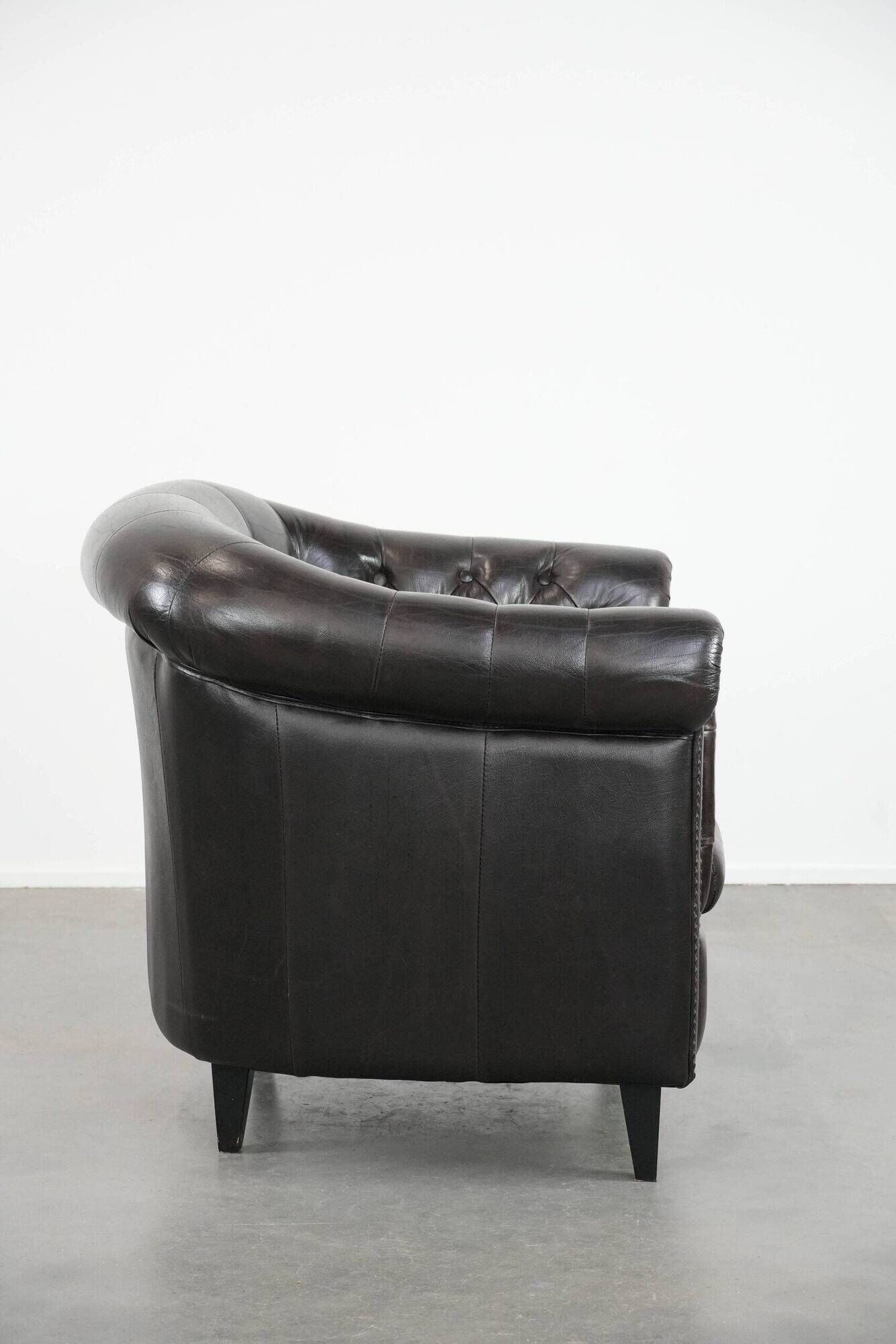 Luxury dark cowhide Chesterfield club armchair in English style