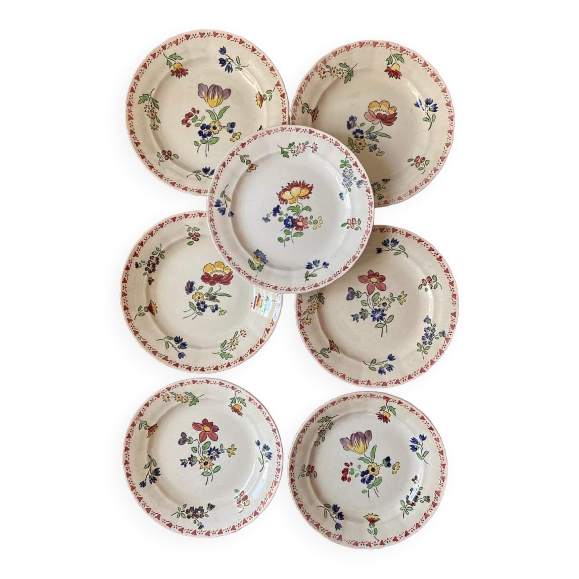7 hand-painted flowered dinner plates.