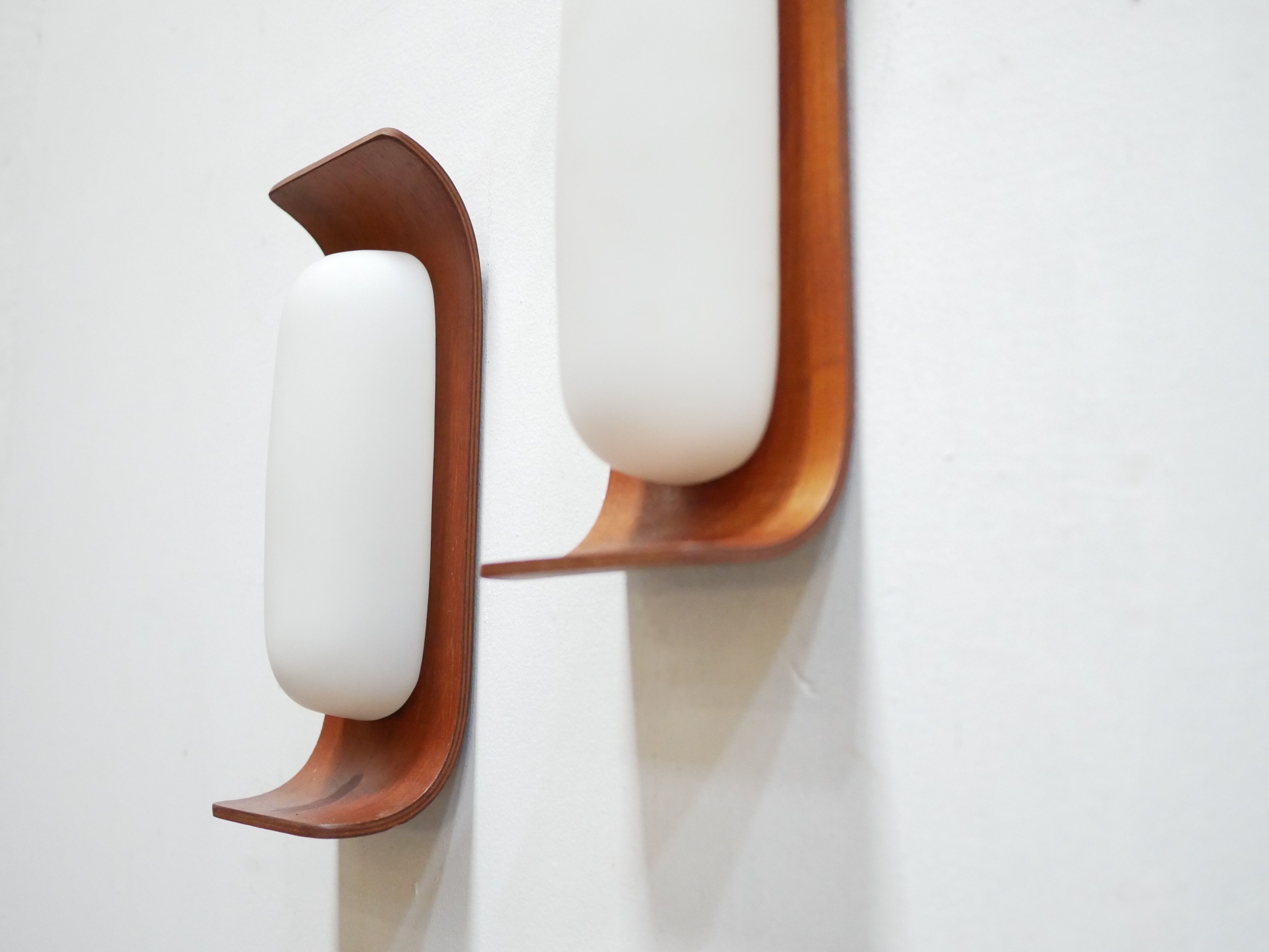 Pair of teak and opaline wall lamps by Goffredo Reggiani