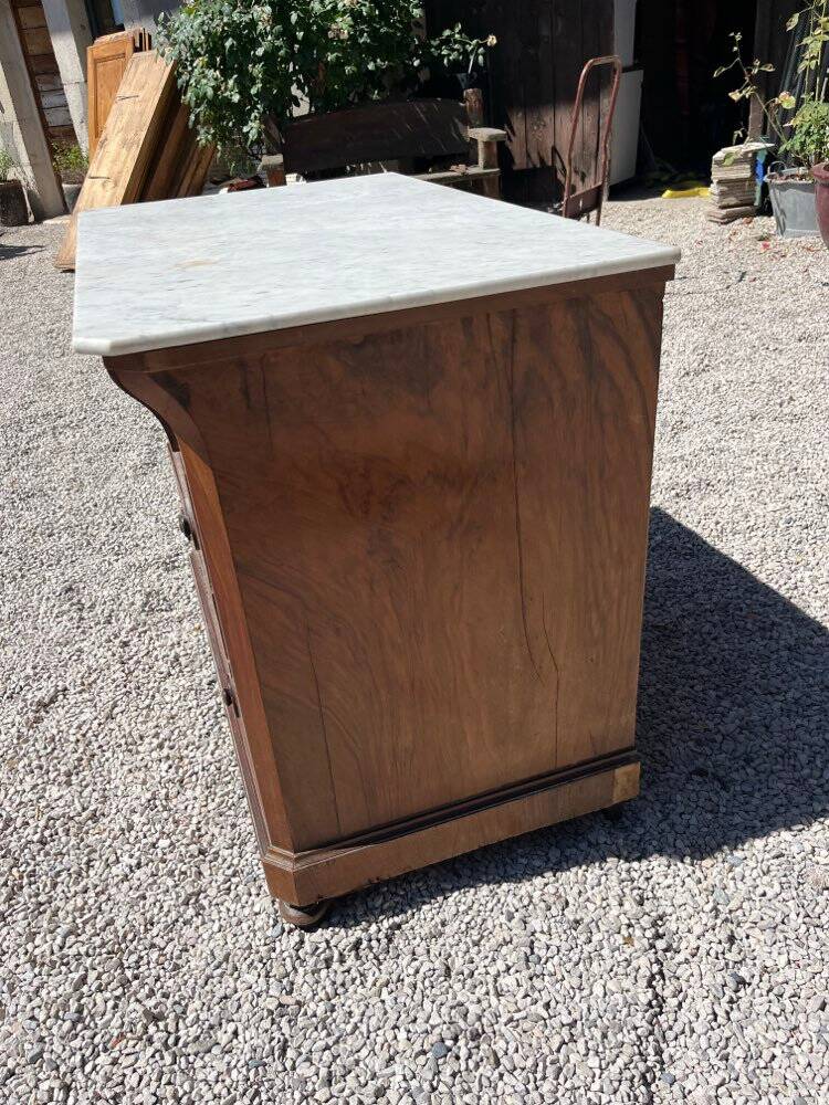 Commode with a white marble top