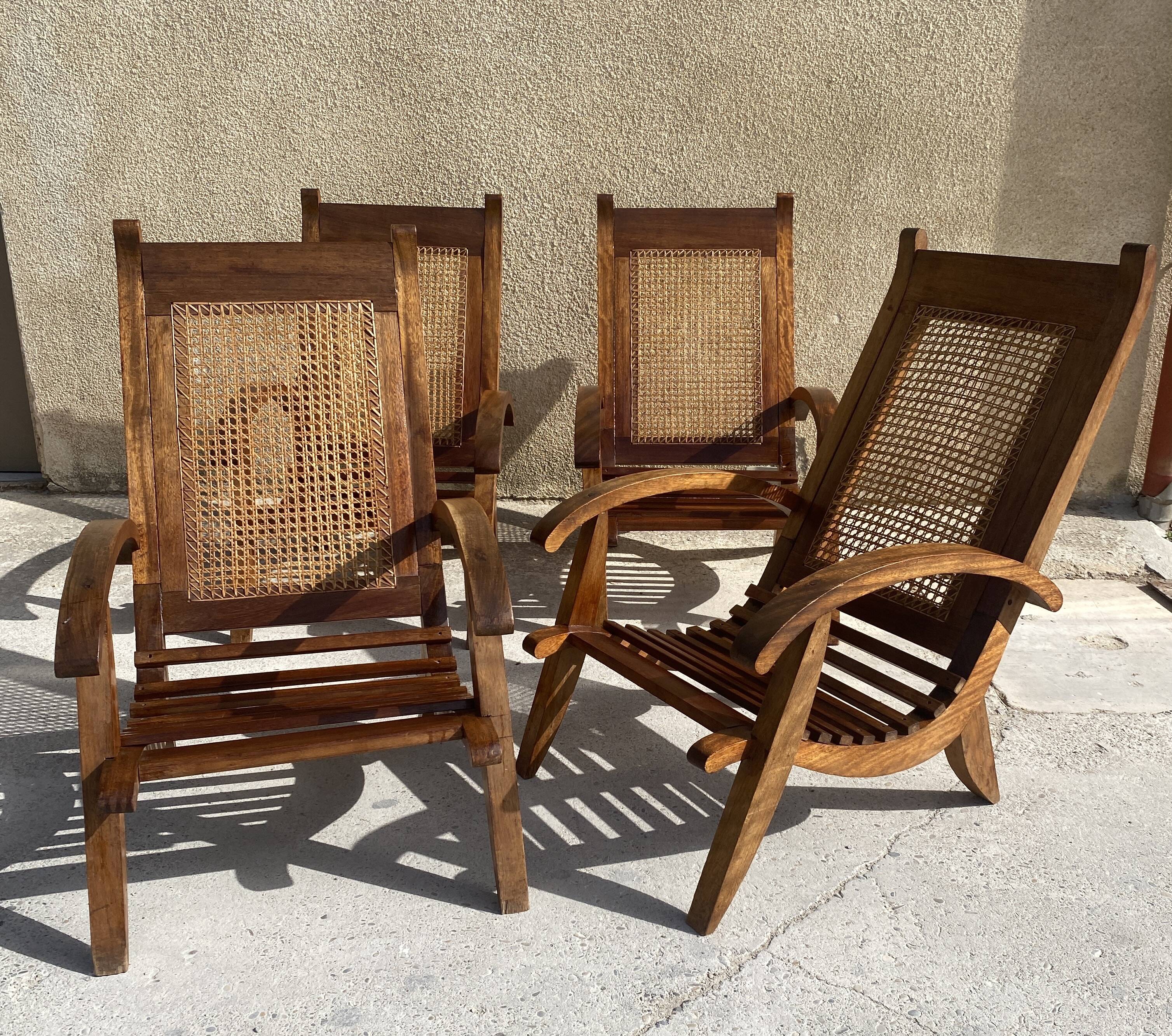 Set of 4 vintage armchairs in cane and wooden slats 1950