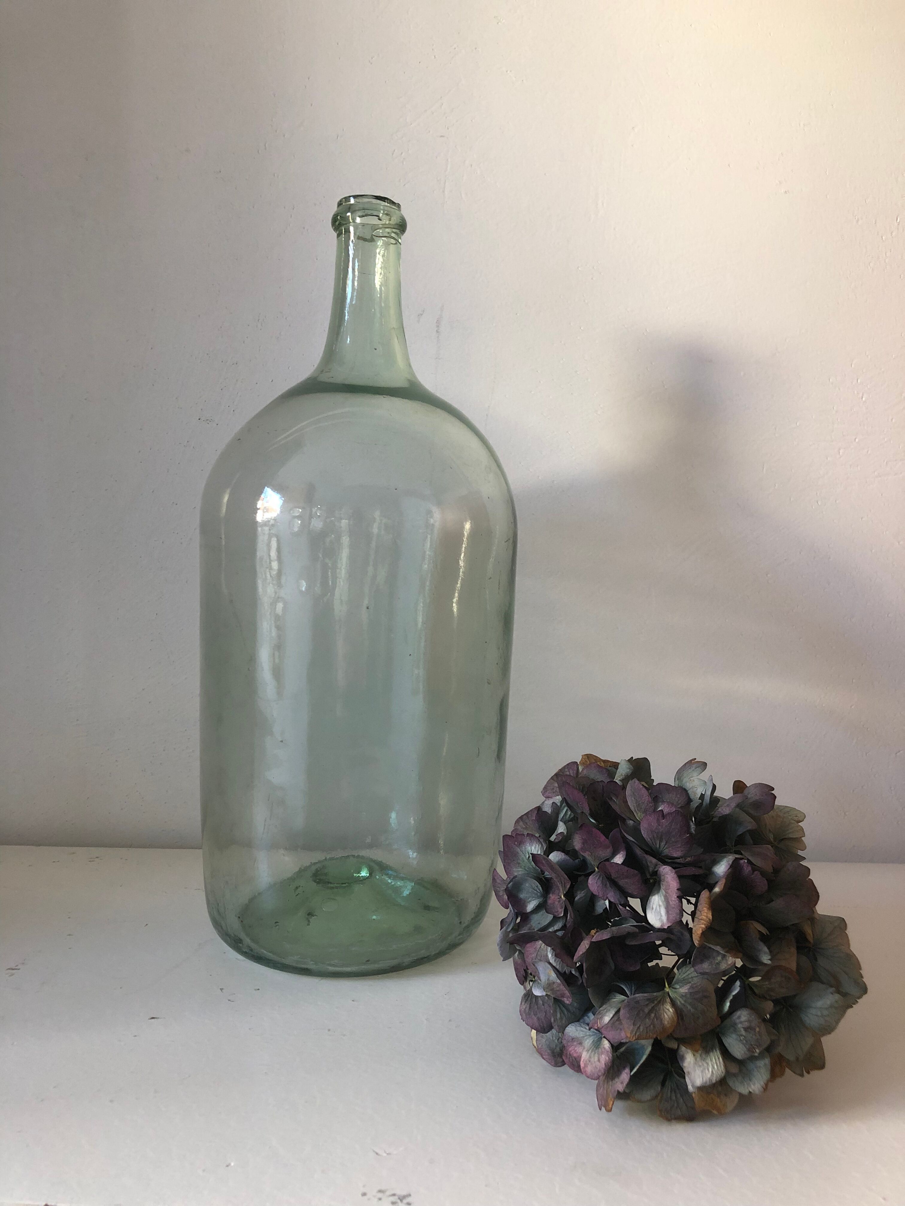 Demijohn old bottle