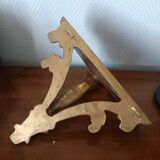 Golden wood wall console in Louis XV style.