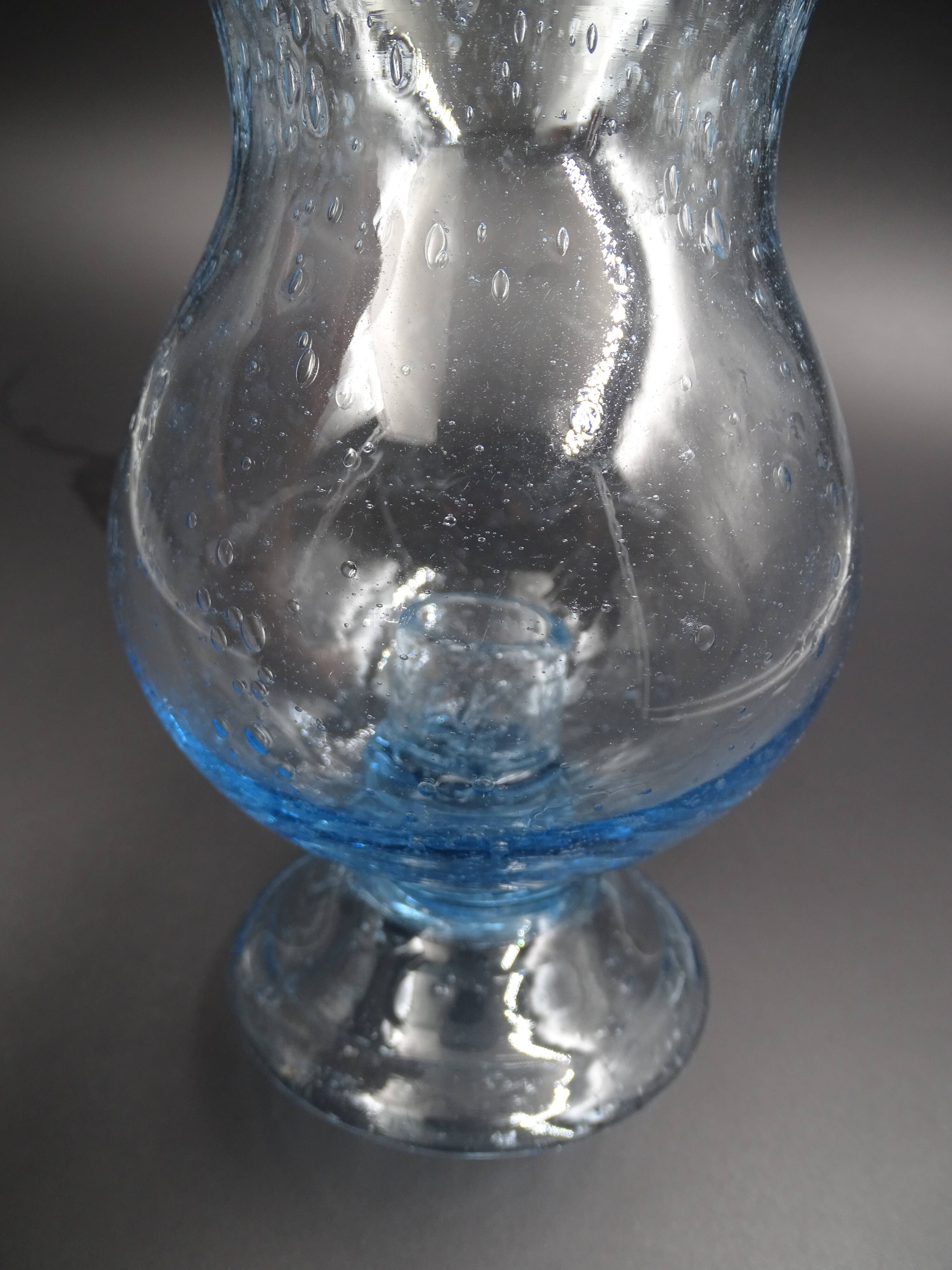 Candlestick or photophore in sky blue bulled glass, signed Biot