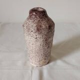 White ceramic vase with brown speckles