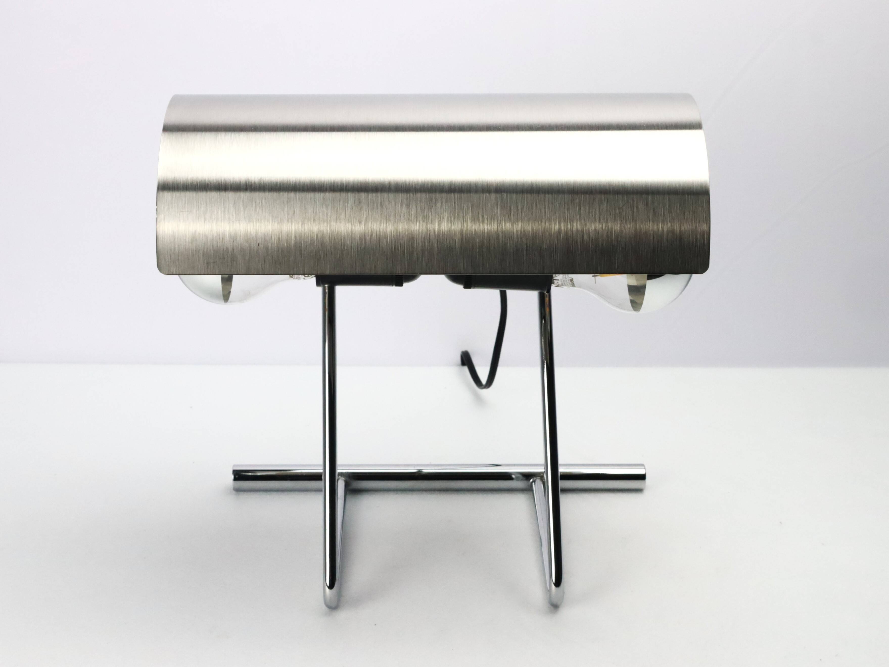 Stainless steel lamp from the 1970s in the style of François Monnet.