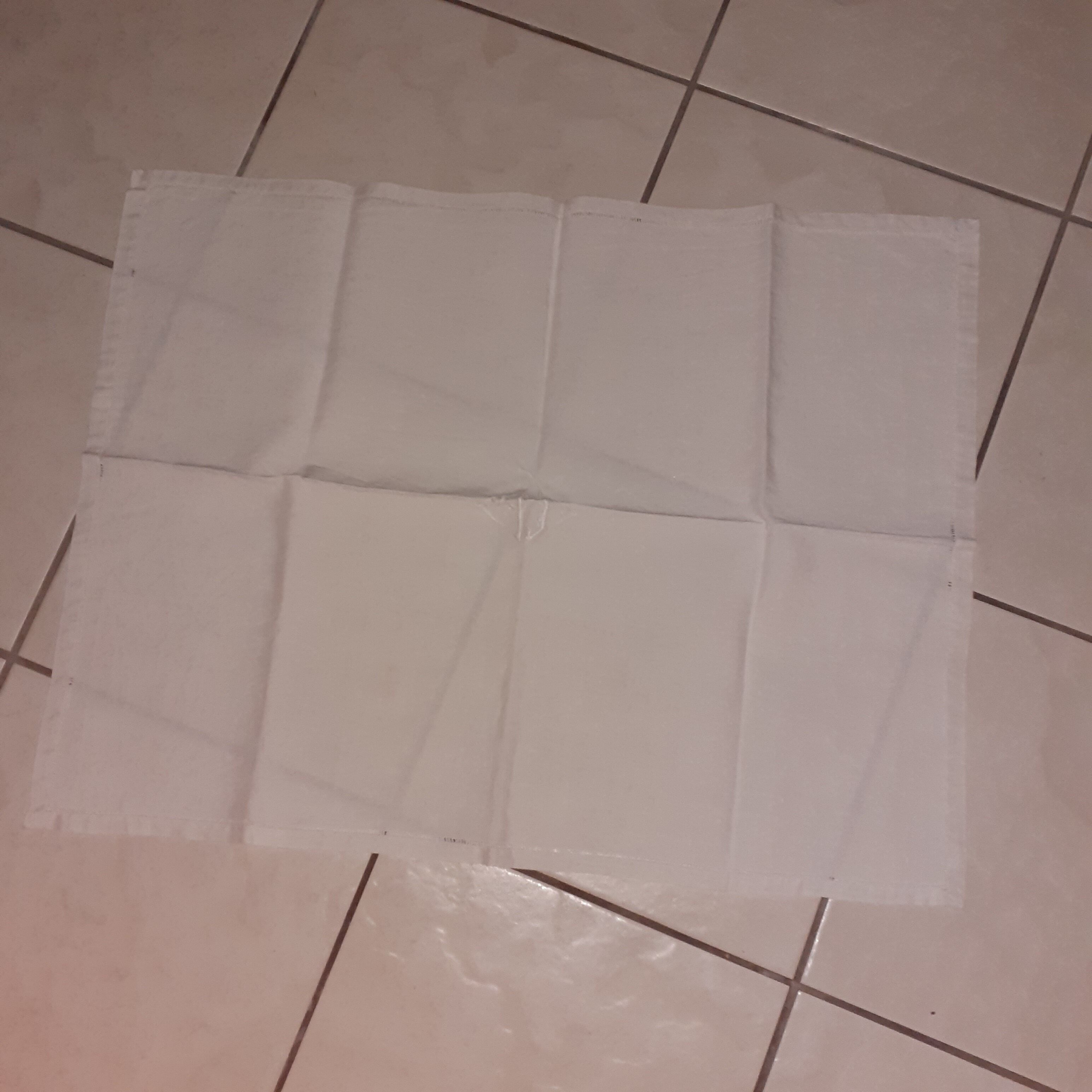 9 old linen towels with monogram in the center.