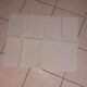 9 old linen towels with monogram in the center.