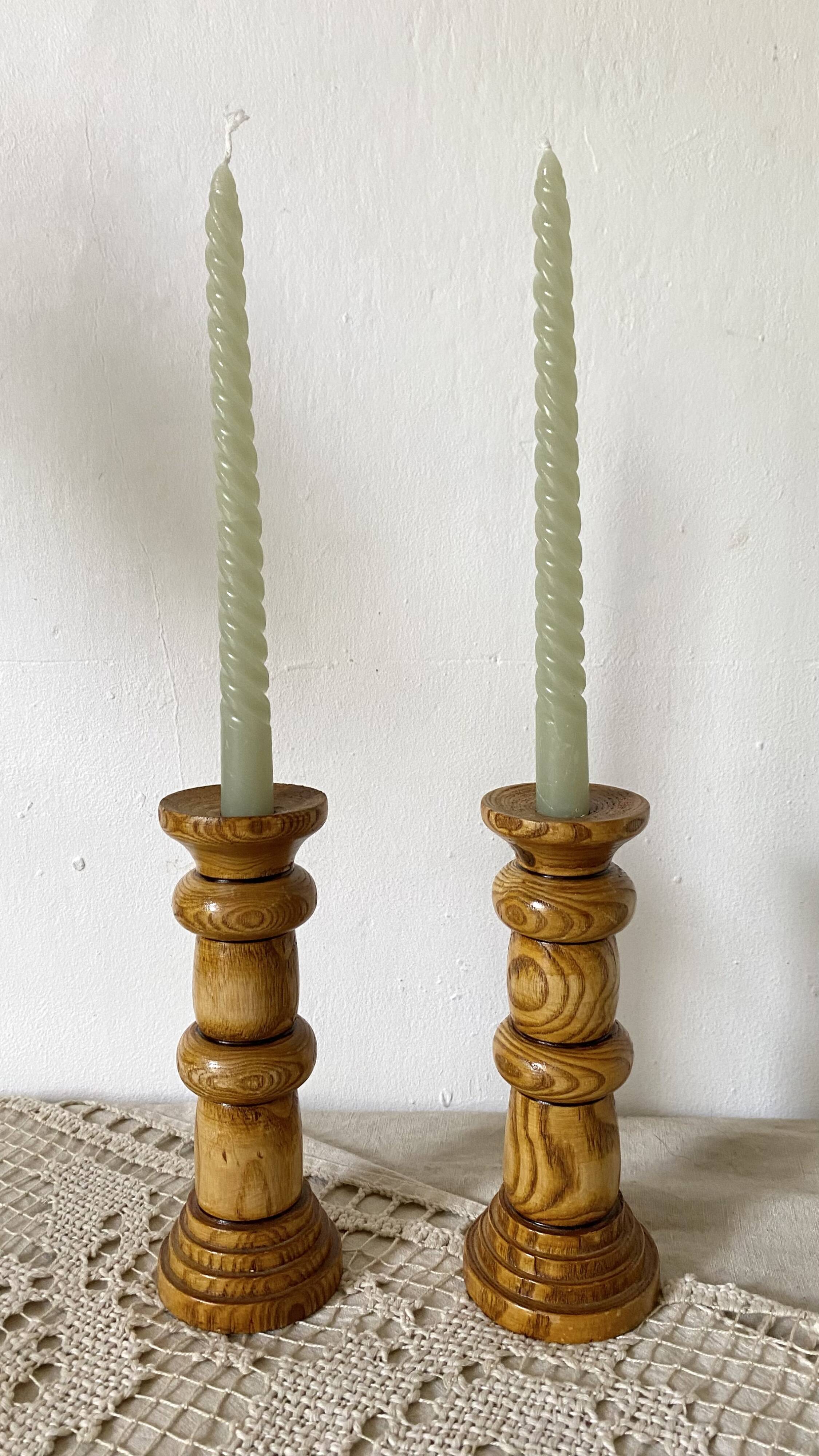 Pair of turned wooden candlesticks