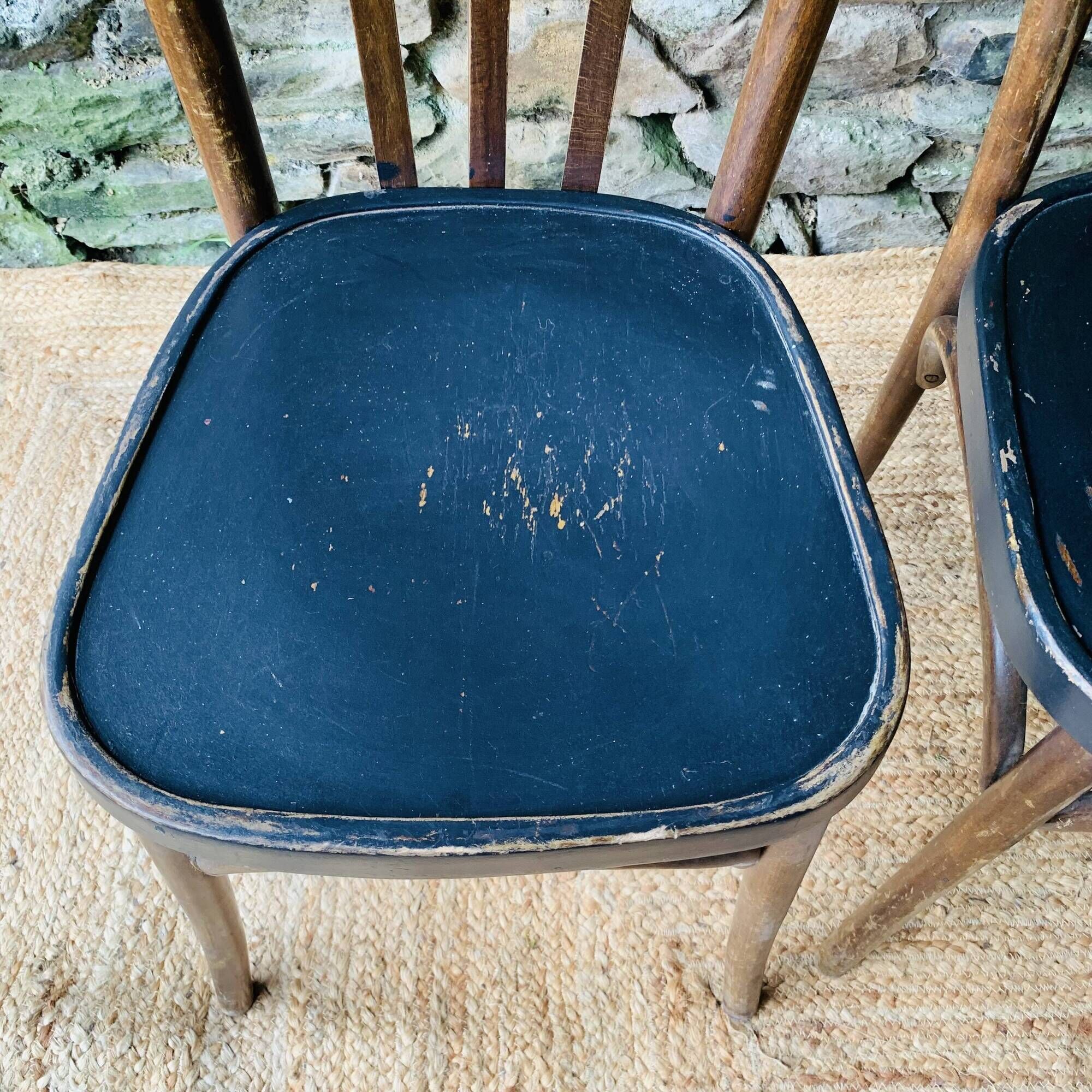 Set of four vintage bentwood bistro chairs.