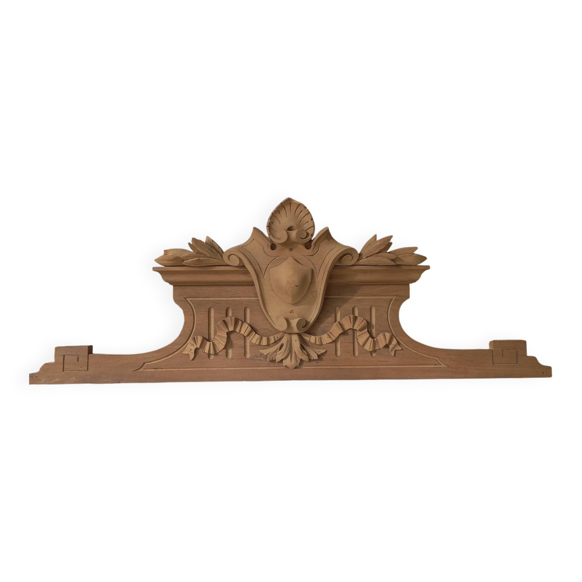 Old sandblasted wooden pediment