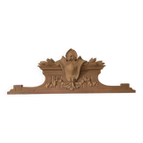 Old sandblasted wooden pediment