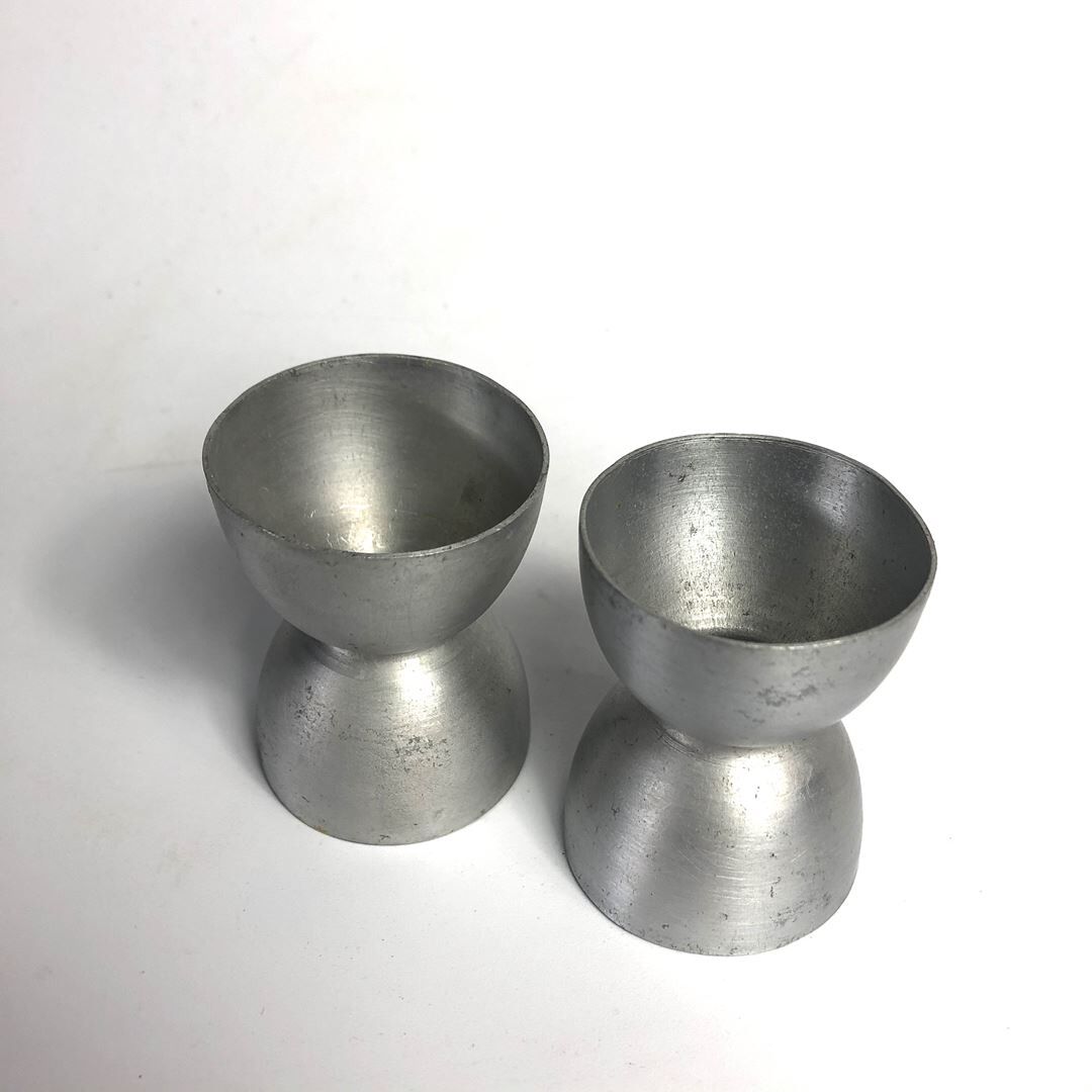 Lot of 2 old aluminum cockroaches