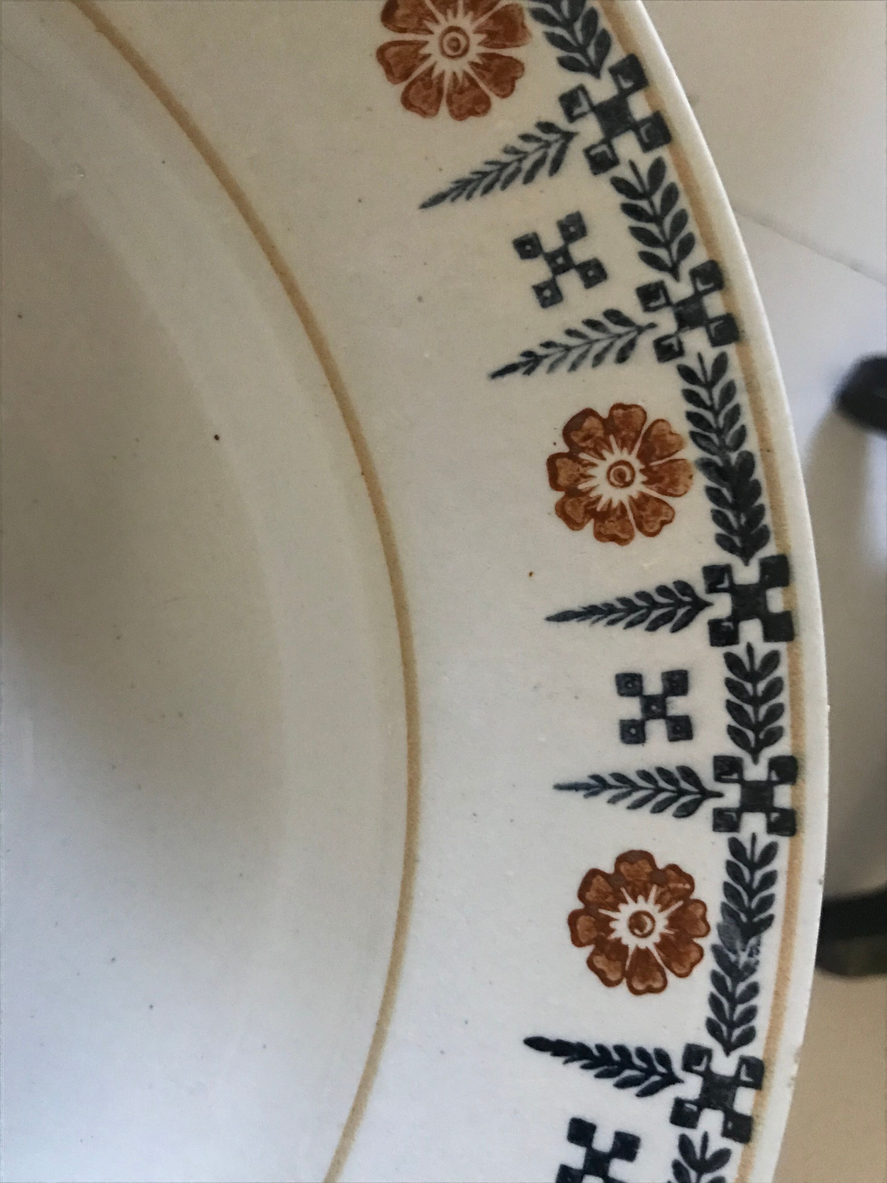 Set of 9 Saint Amand hollow plates