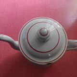 White enamelled sheet metal coffee maker with red and blue patterns