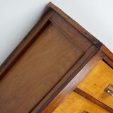 School cabinet bank of vintage Dutch drawers in mid-twentieth century pine