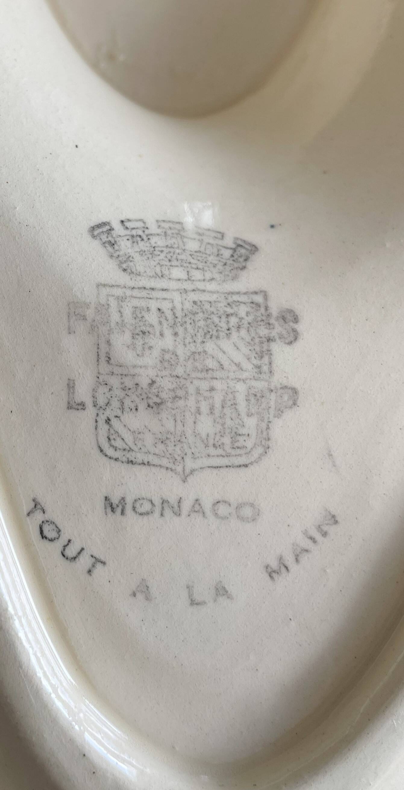 Large antique sauceboat in Longchamp earthenware.