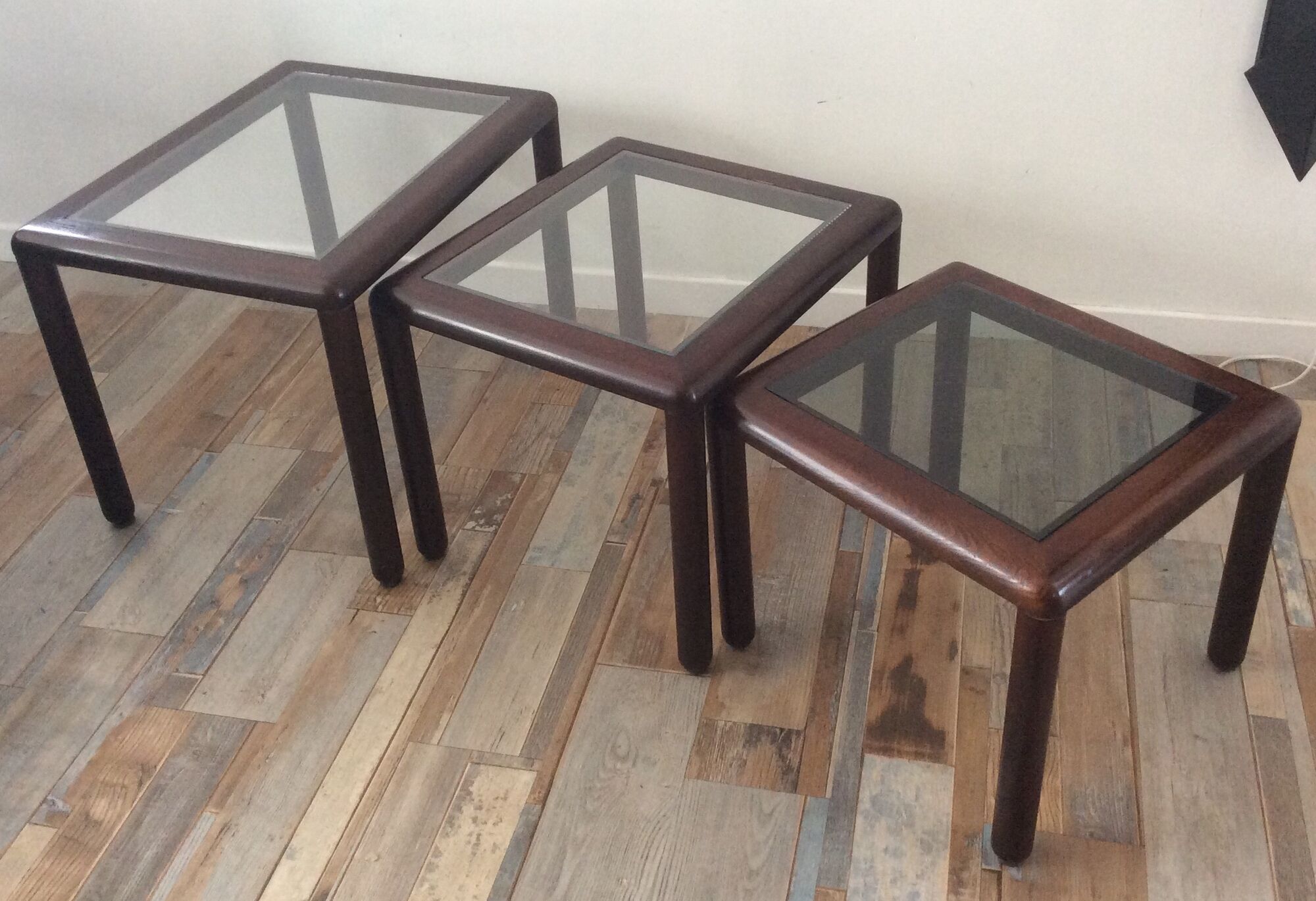 Series of 3 wooden and glass tables from the 70s