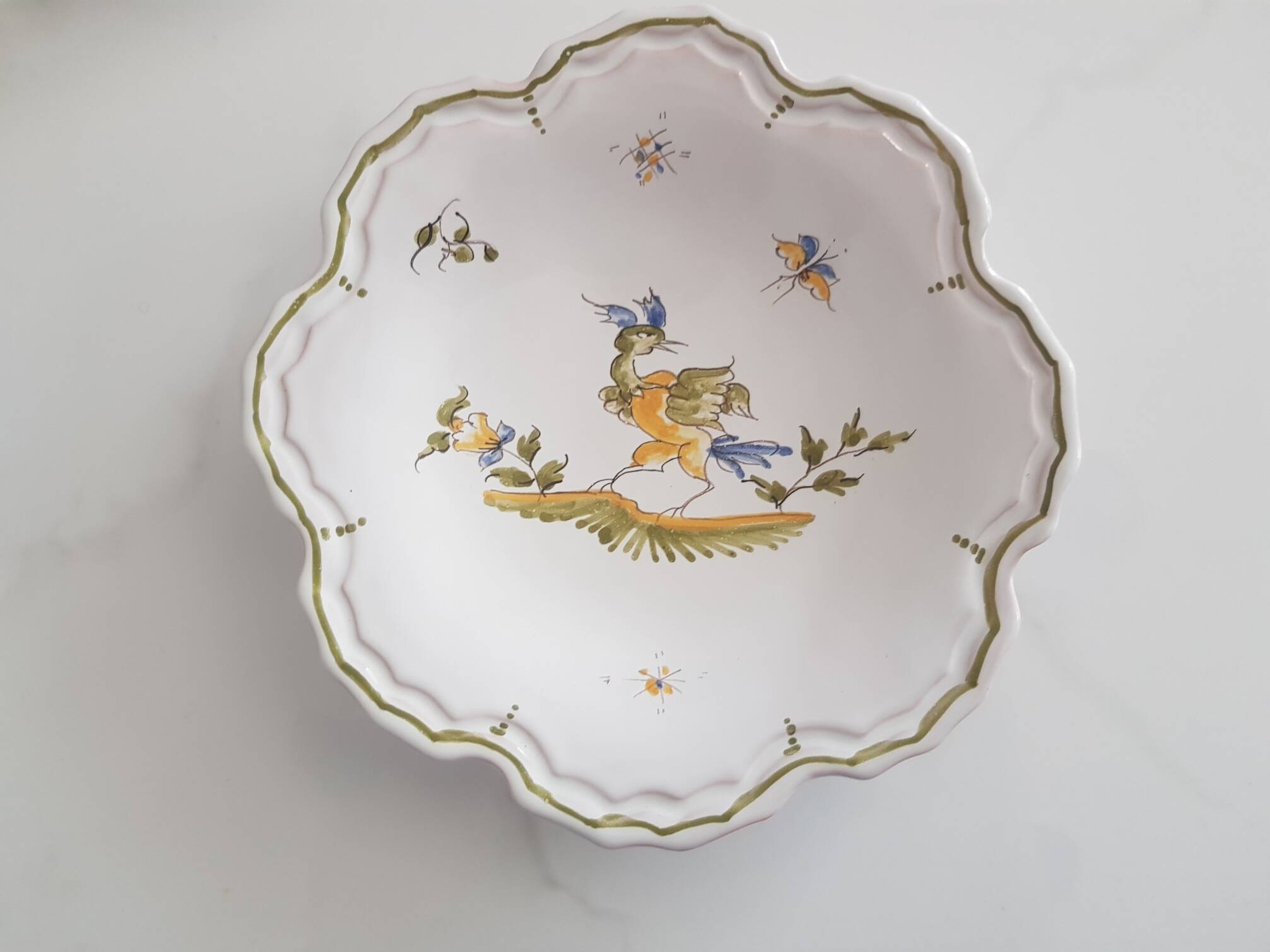 3 small signed Moustiers decorated plates with lace