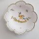 3 small signed Moustiers decorated plates with lace