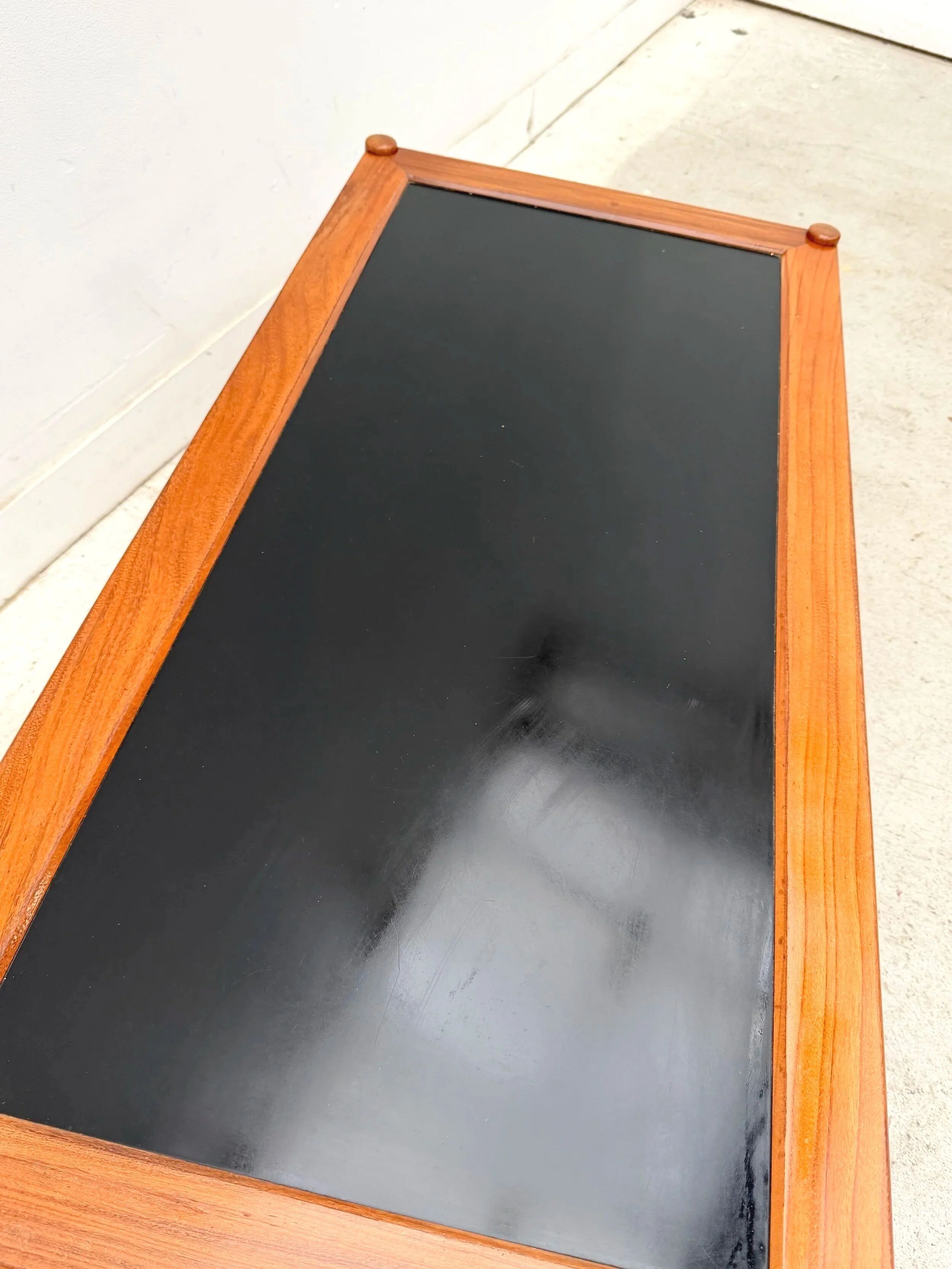 Scandinavian coffee table in teak and black formica, 1960.