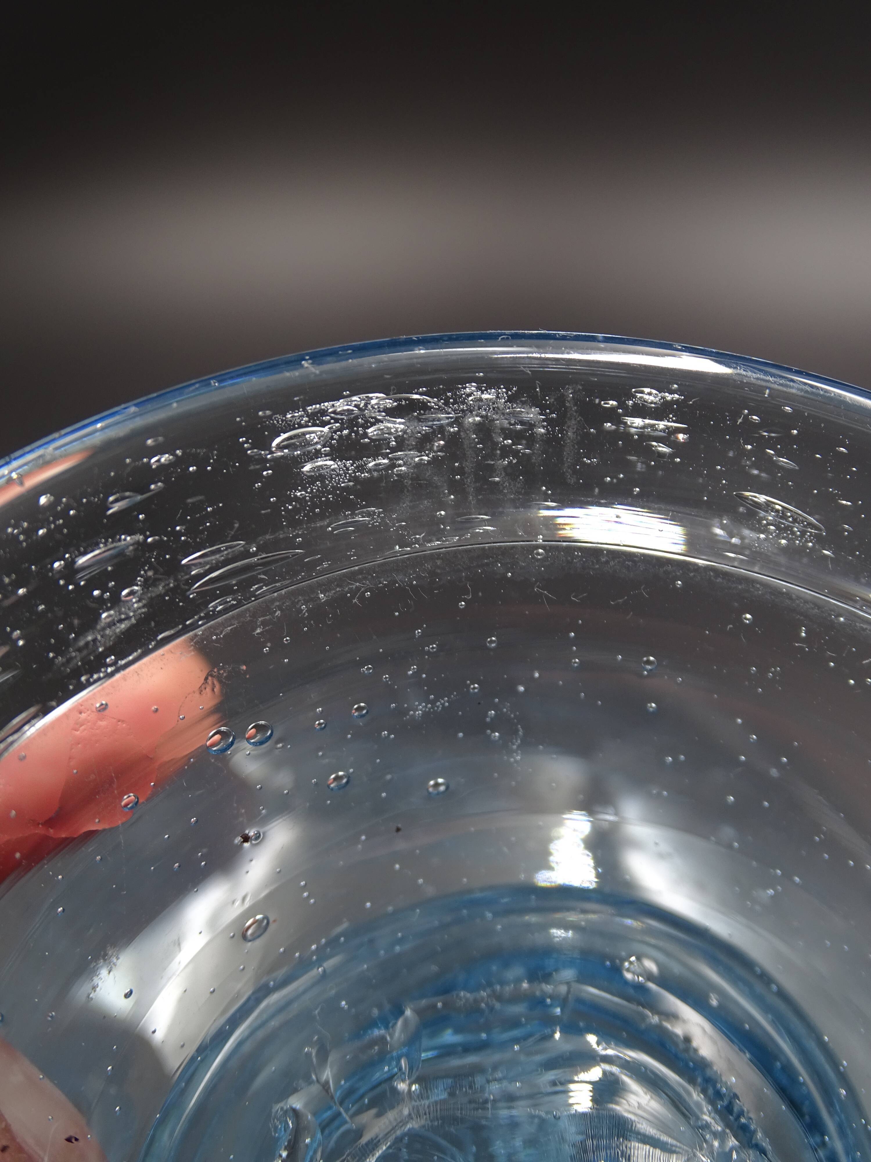 Candlestick or photophore in sky blue bulled glass, signed Biot