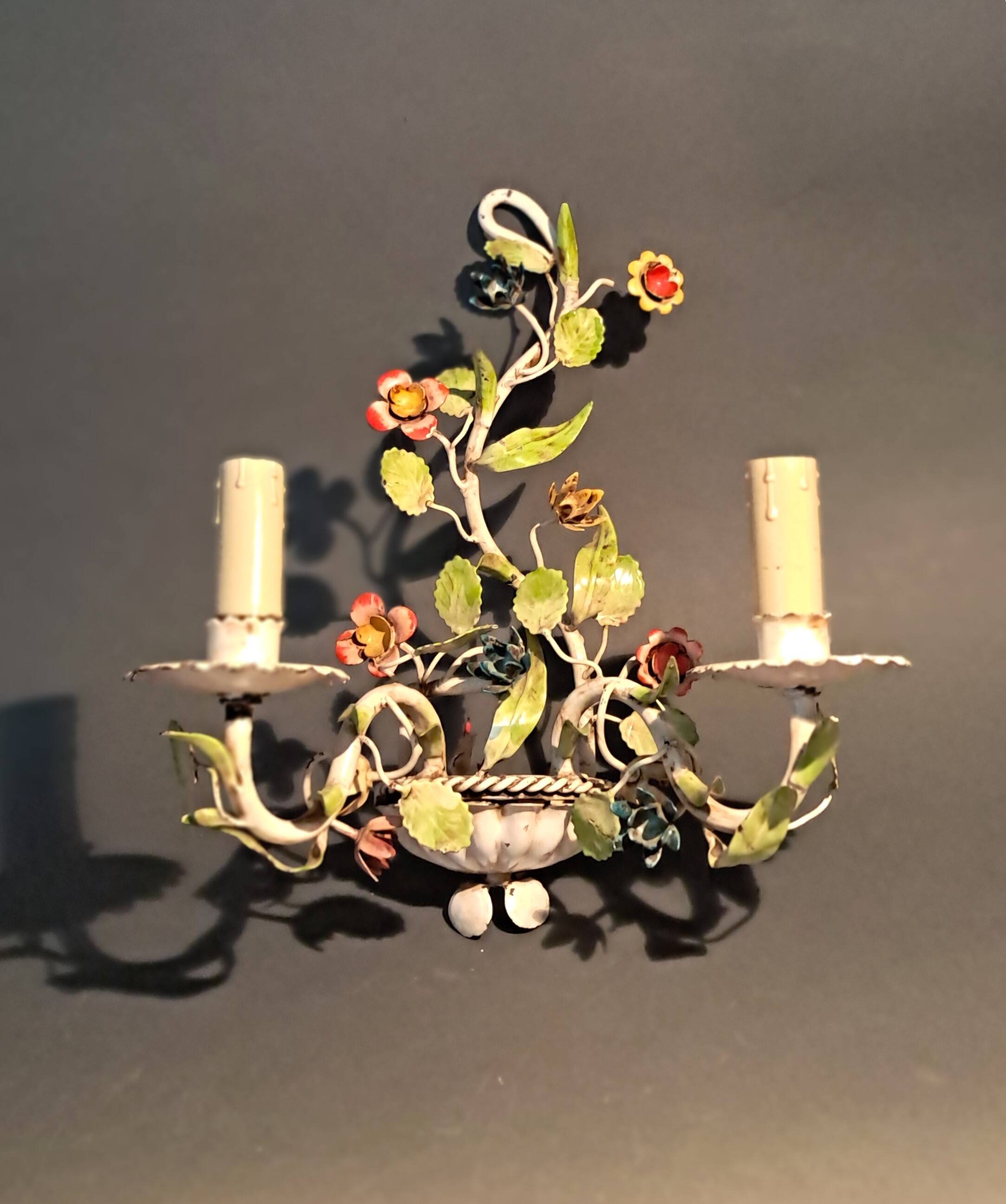 Two-light polychrome painted wrought iron wall lights, Italy 1950/1960.