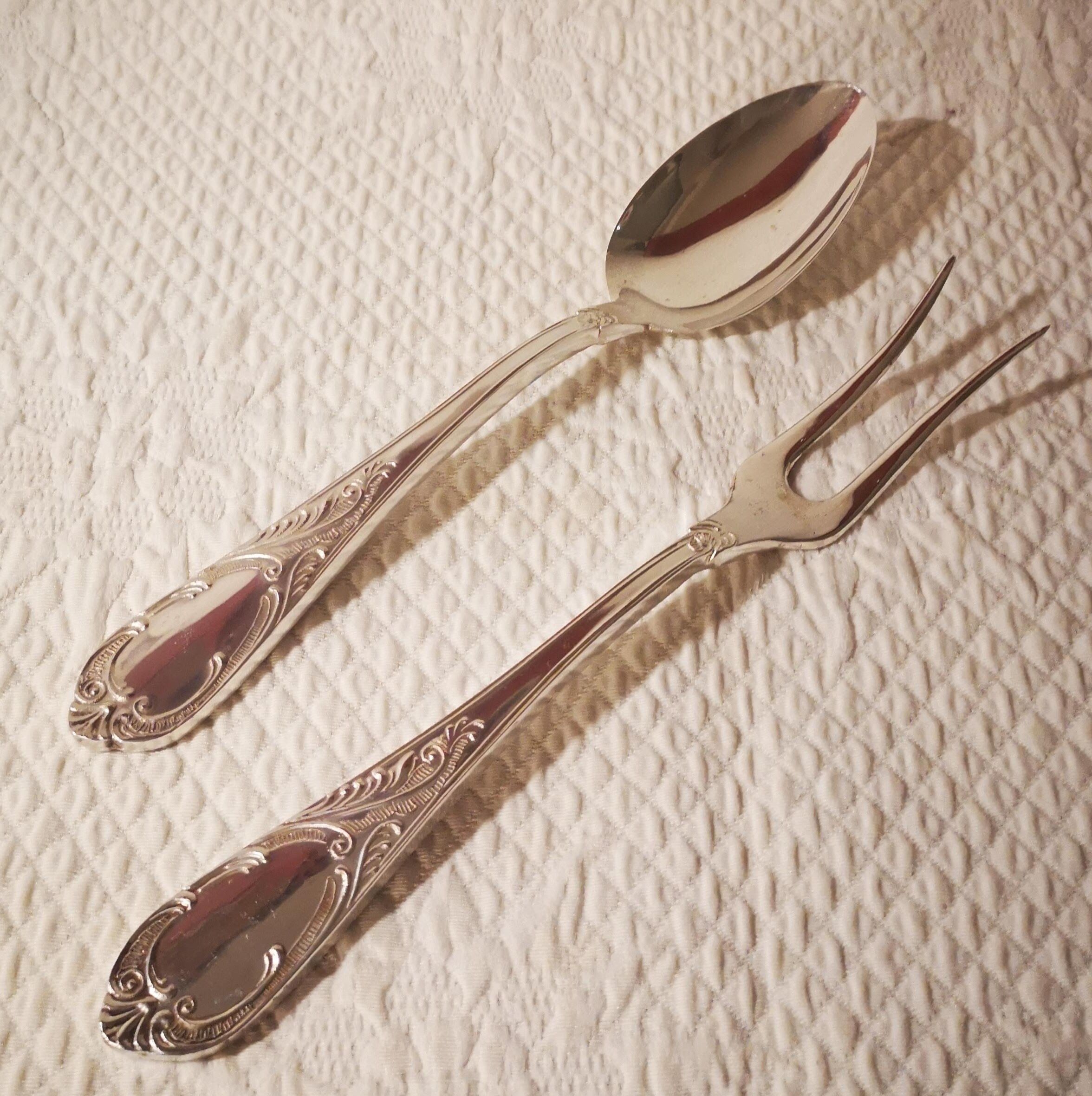 Silver metal service cutlery